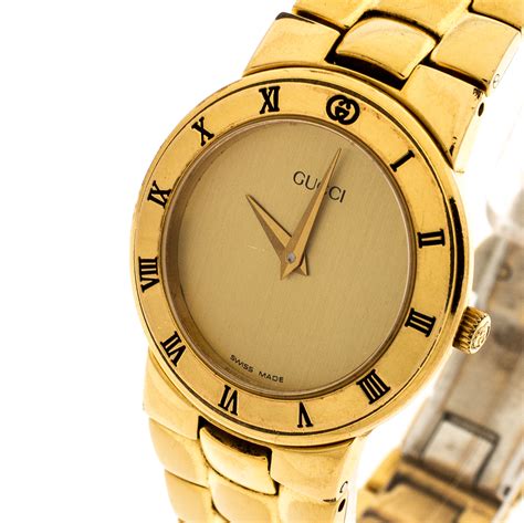 gucci gold watch women's